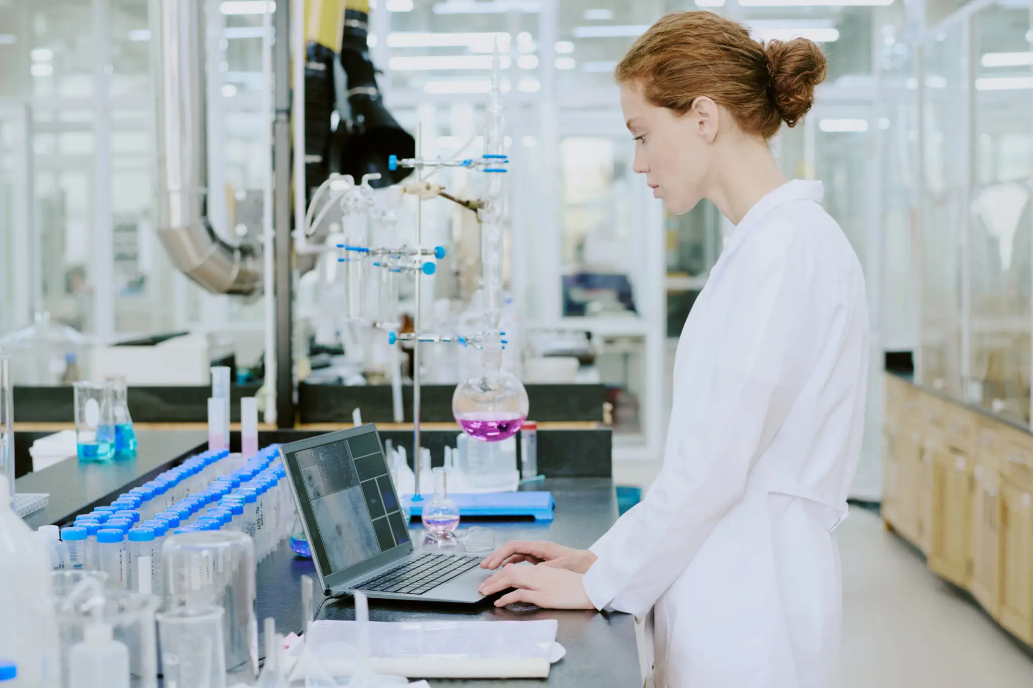 scientist-working-in-modern-laboratory-with-equipment